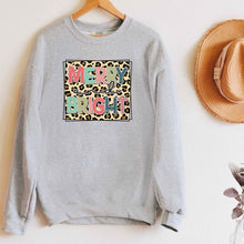 LEOPARD BRIGHT CHRISTMAS GRAPHIC SWEATSHIRT