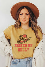 RAISED ON DOLLY GRAPHIC TEE - 9 Colors